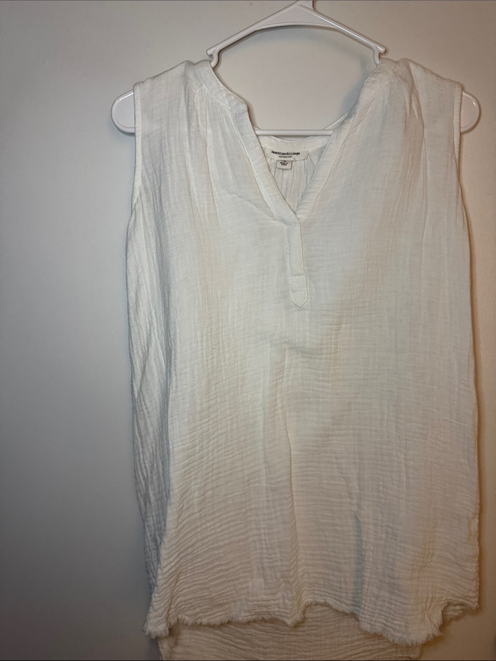 beachlunchlounge White Gauzy Sleeveless V-Neck Top